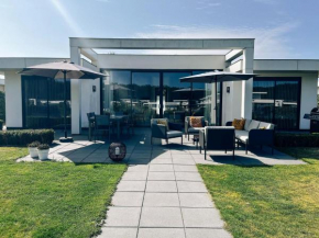Luxury holiday home in Zeewolde with garden and bubble bath